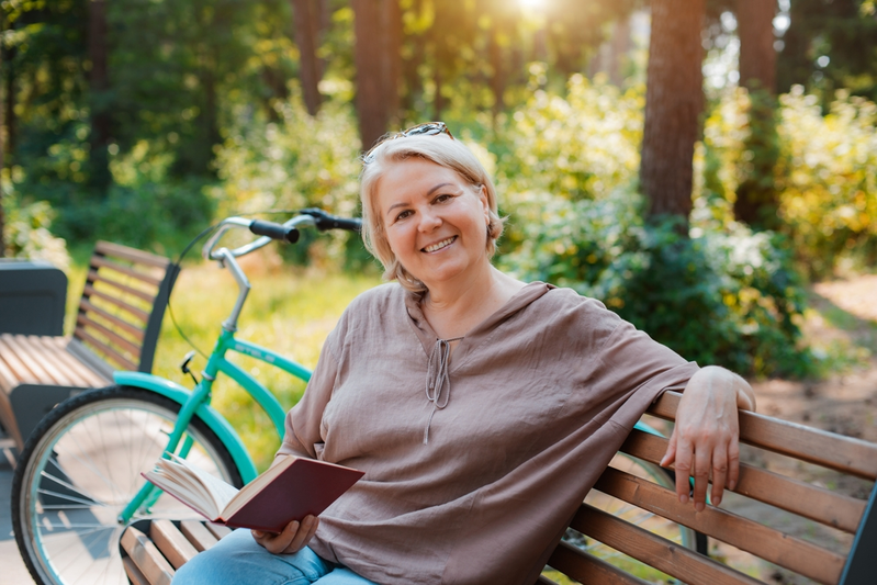 active_mature_woman_relaxing_in_park