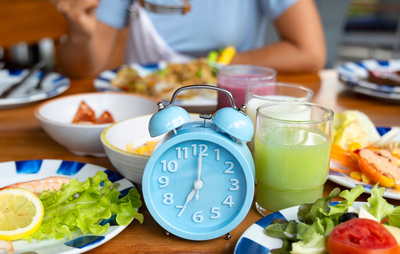 woman eating food during her intermittent fast