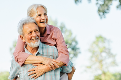 smiling and healthy older couple