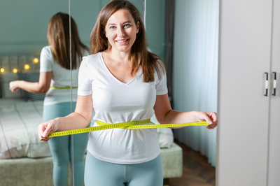 woman happy with weight loss