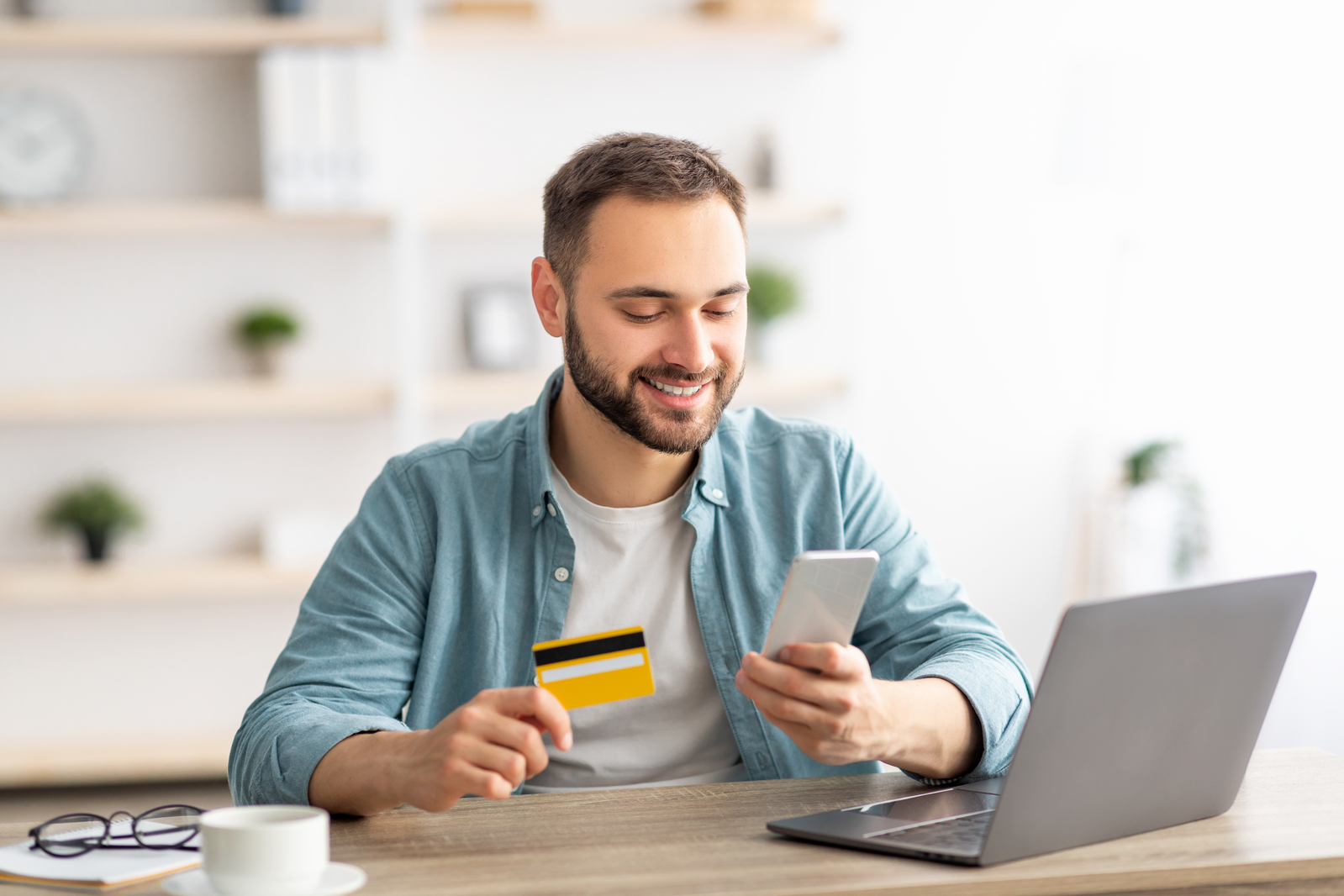 man paying for something on his phone