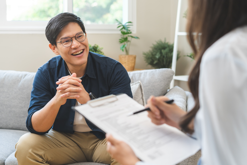 smiling man with doctor