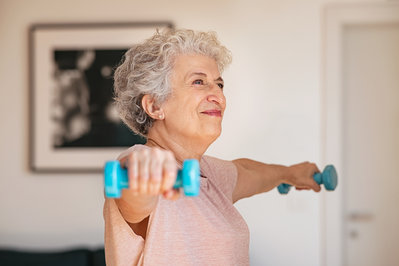 older woman lifting weights