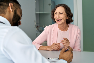 doctor listens to patient