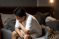 man in bed with premature ejaculation